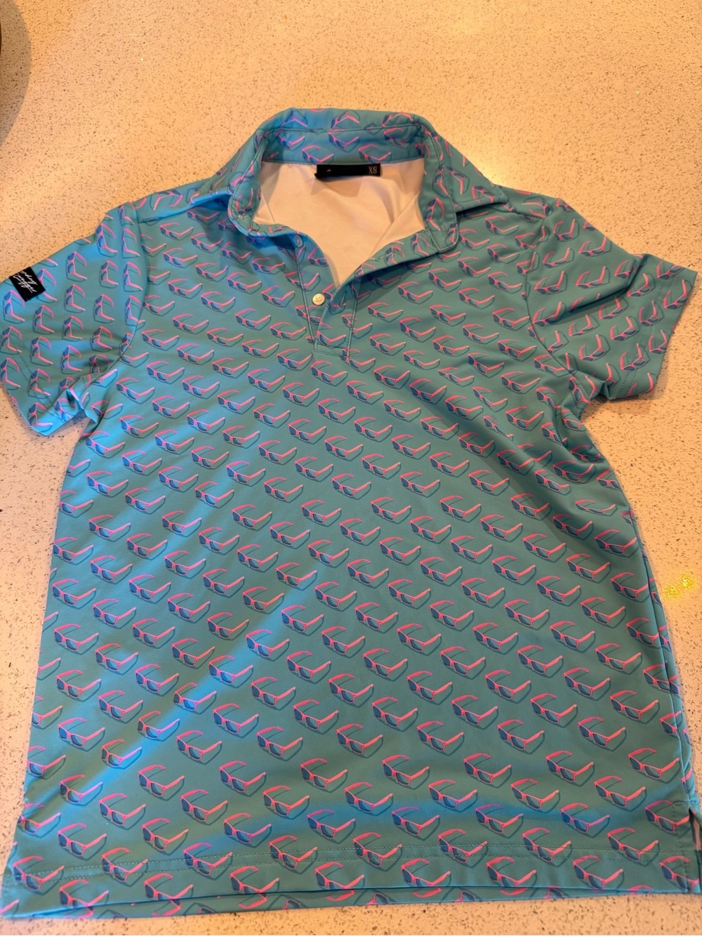 Teal Short-Sleeve Polo with Pink Accent Print